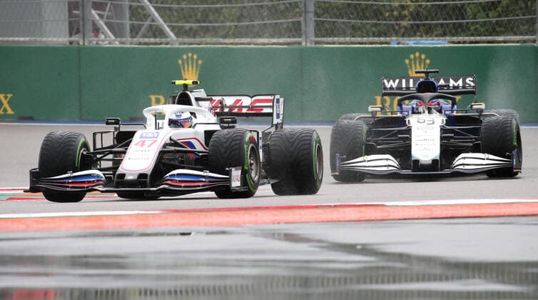 SOCHI, RUSSIA â€“ SEPTEMBER 25, 2021: Haas F1 Team driver Mick Schumacher (L) of Germany and Williams Racing F1 driver George Russell of the United Kingdom compete in a qualifying session for the 2021 Formula One Russian Grand Prix, at the Sochi Autodrom racing circuit. Sergei Fadeichev TASS  TS111E49