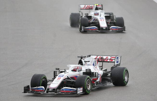 SOCHI, RUSSIA â€“ SEPTEMBER 25, 2021: Haas F1 Team drivers Nikita Mazepin (L) of Russia and Mick Schumacher of Germany compete in a qualifying session for the 2021 Formula One Russian Grand Prix, at the Sochi Autodrom racing circuit. Sergei Fadeichev TASS  TS111E4D