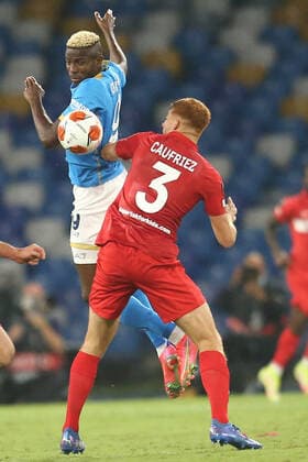 Italy: Europa League football match SSC Napoli vs Spartak Mosca SSC Napoli s Nigerian striker Victor Osimhen (L) challenges for the ball with Spartak Mosca s Belgian defender Maximiliano Caufriez during the UEFA Europa League first round day three Group C football match between SSC Napoli and Spartak Mosca at the Diego Armando Maradona Stadium in Naples, southern Italy, on September 30, 2021. ABPH3186 Copyright: xAntonioxBalascox