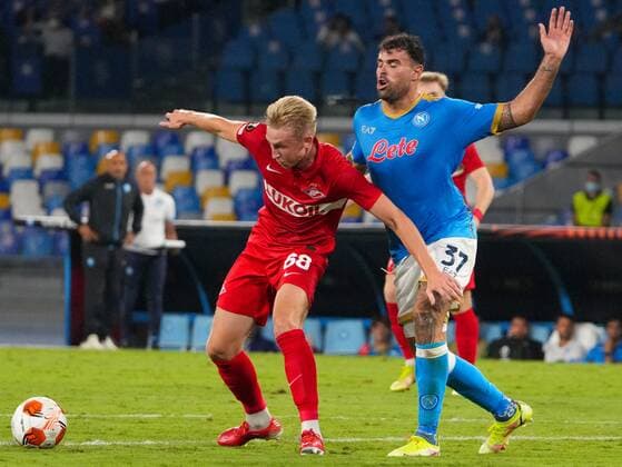 6663076 30.09.2021 Spartak s Ruslan Litvinov, left, and Napoli s Andrea Petagna struggle for a ball during the Europa League soccer match between Napoli and Spartak Moscow, at Diego Armando Maradona stadium, in Naples, Italy. Alexander Vilf Sputnik Italy Soccer Europa League Napoli - Spartak  dfe59446f288560c