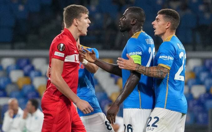 6663060 30.09.2021 From left, Spartak s Aleksandr Sobolev, Napoli s Kalidou Koulibaly and Giovanni Di Lorenzo clash during the Europa League soccer match between Napoli and Spartak Moscow, at Diego Armando Maradona stadium, in Naples, Italy. Alexander Vilf Sputnik Italy Soccer Europa League Napoli - Spartak  8d6e9691f92c4aac