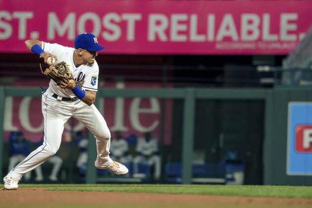 Kansas City Royals second baseman Nicky Lopez (8) turns to throw a Minnesota Twins runner out at first in the first inning at Kaufman Stadium in Kansas City, Missouri on Friday, October 1, 2021.  KCP20211001107 KYLExRIVAS