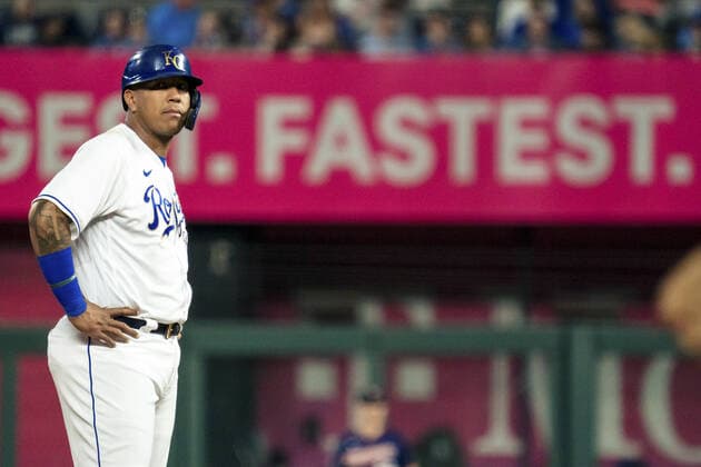Kansas City Royals catcher Salvador Perez (13) waits at second base while taking on the Minnesota Twins in the first inning at Kaufman Stadium in Kansas City, Missouri on Friday, October 1, 2021.  KCP20211001109 KYLExRIVAS
