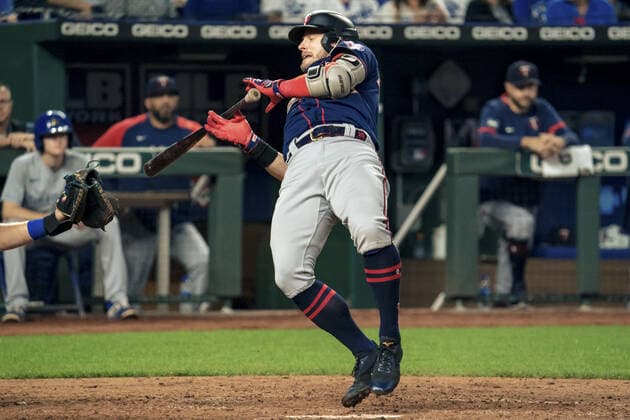 Minnesota Twins third baseman Josh Donaldson (20) is hit by a Kansas City Royals pitch in the sixth inning at Kaufman Stadium in Kansas City, Missouri on Friday, October 1, 2021.  KCP20211001119 KYLExRIVAS