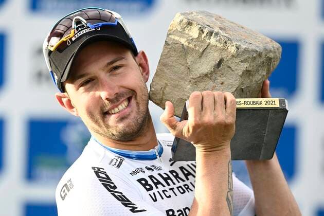 ROUBAIX, FRANCE - OCTOBER 03 : COLBRELLI Sonny (ITA) of BAHRAIN VICTORIOUS pictured during the podium ceremony after winning the UCI World Tour 118th Paris Roubaix cycling race with start in Compiegne and finish at the Velodrome Andre-Petrieux in Roubaix on October 03, 2021 in Roubaix, France, 3 10 2021 ( Motordriver Kenny Verfaillie - Paris Roubaix 2021 UCI World Tour Cycling Race PhotoNews Panoramic 
