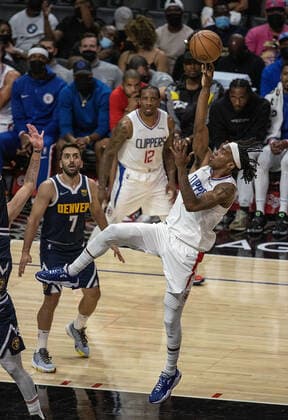 October 4, 2021, Los Angeles, California, USA: Reggie Jackson 1 of the Los Angeles Clippers takes a shot during their preseason NBA, Basketball Herren, USA game with the Denver Nuggets on Monday October 4, 2021 at the Staples Center in Los Angeles, California. Clippers defeat Nuggets, 103 - 102. PI Los Angeles USA - ZUMAp124 20211004_zaa_p124_016 Copyright: xJAVIERxROJASx