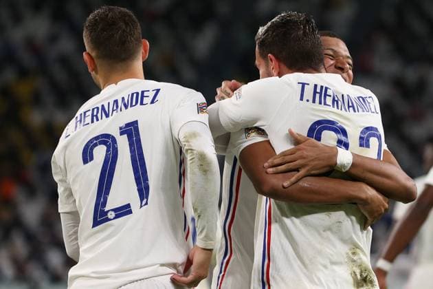 Turin, Italy, 7th October 2021. Theo Hernandez of France celebrates with team mates Kylian Mbappe and Lucas Hernandez after scoring to give the side a 3-2 lead during the UEFA Nations League match at Juventus Stadium, Turin. Picture credit should read: Jonathan Moscrop Sportimage EDITORIAL USE ONLY. No use with unauthorised audio, video, data, fixture lists, club league logos or live services. Online in-match use limited to 120 images, no video emulation. No use in betting, games or single club league player publications. SPI-1228-0180