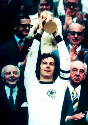 Franz Beckenbauer lifts the trophy after West Germany?s victory over the Netherlands at the 1974 FIFA World Cup, WM, Weltmeisterschaft, Fussball , Franz Beckenbauer Olimpiastadio, Munich, Germany, Ref:VM FWC74 001 Franz Beckenbauer West Germany.jpg, FIFA World Cup, West Germany, Franz Beckenbauer, trophy, soccer, football, Munich, Olimpiastadion, celebrations, 1974 Copyright: xVarleyxMediaxx