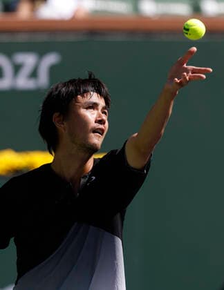 October 09, 2021 Taro Daniel of Japan serves to Reilly Opelka at the 2021 BNP Paribas Open at Indian Wells Tennis Garden in Indian Wells, California. Mandatory Photo Credit : CSM Indian Wells United States of America - ZUMAc04_ 20211009_zaf_c04_073 Copyright: xCharlesxBausx