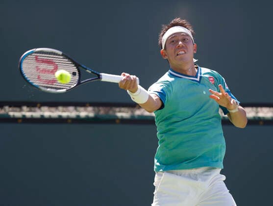 October 09, 2021 Kei Nishikori of Japan returns a shot against Dan Evans of Great Britain during the 2021 BNP Paribas Open at Indian Wells Tennis Garden in Indian Wells, California. Mandatory Photo Credit : CSM Indian Wells United States of America - ZUMAc04_ 20211009_zaf_c04_106 Copyright: xCharlesxBausx