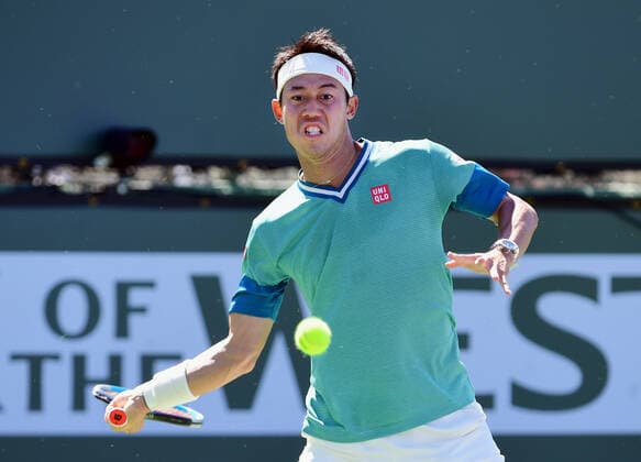 INDIAN WELLS, CA - OCTOBER 09: Kei Nishikori of Japan returns the ball in a tennis match during the BNP Paribas Open played on October 9, 2021 at the Indian Wells Tennis Garden in Indian Wells, CA. (Photo by John Cordes Icon Sportswire) TENNIS: OCT 09 BNP Paribas Open Icon506211009012