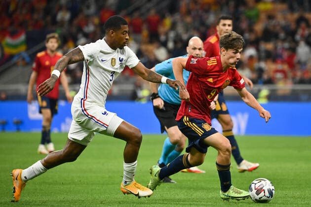 Photo LaPresse - Massimo Paolone October, 10 2021 Milan, Italy soccer Spain vs France - Nations League Final Season 2020 2021 - San Siro Stadium of Milan. In the pic: Gavi (Spain) competes for the ball with Presnel Kimpembe (France)  Copyright: xMassimoxPaolone LaPressex