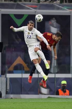 Milan, Italy, 10th October 2021. Theo Hernandez of France and Cesar Azpilicueta of Spain contest for an aerial ball during the UEFA Nations League match at Stadio Giuseppe Meazza, Milan. Picture credit should read: Jonathan Moscrop Sportimage EDITORIAL USE ONLY. No use with unauthorised audio, video, data, fixture lists, club league logos or live services. Online in-match use limited to 120 images, no video emulation. No use in betting, games or single club league player publications. SPI-1236-0016