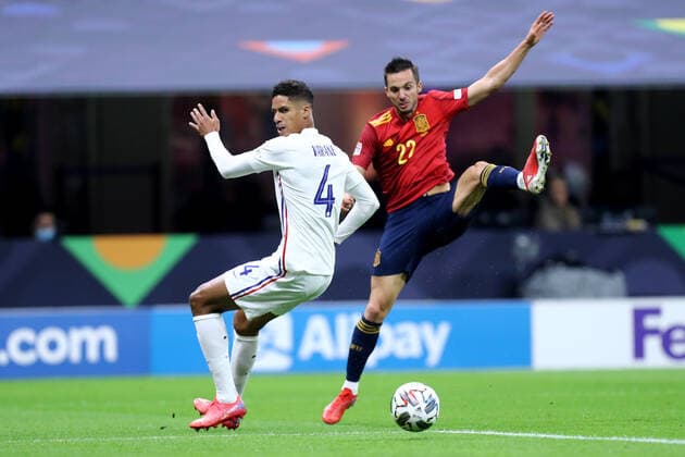 Spain - France Raphael Varane of France and Pablo Sarabia of Spain battle for the ball during the Uefa Nations League final match between Spain and France at Stadio Giuseppe Meazza on October 10, 2021 in Milan, Italy. Milano Stadio Giuseppe Meazza Italy Copyright: xMarcoxCanonierox