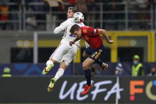 Milan, Italy, 10th October 2021. Theo Hernandez of France and Cesar Azpilicueta of Spain challenge for an aerial ball during the UEFA Nations League match at Stadio Giuseppe Meazza, Milan. Picture credit should read: Jonathan Moscrop Sportimage EDITORIAL USE ONLY. No use with unauthorised audio, video, data, fixture lists, club league logos or live services. Online in-match use limited to 120 images, no video emulation. No use in betting, games or single club league player publications. SPI-1236-0017