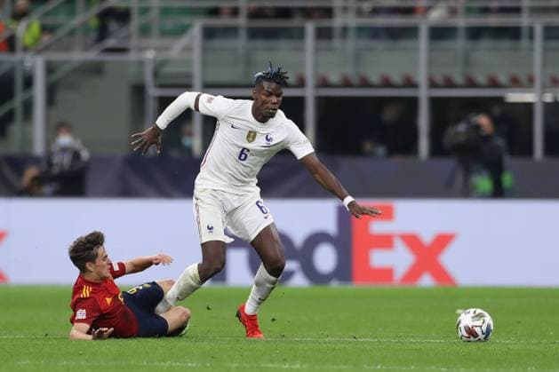 Milan, Italy, 10th October 2021. Gavi of Spain clashes with Paul Pogba of France during the UEFA Nations League match at Stadio Giuseppe Meazza, Milan. Picture credit should read: Jonathan Moscrop Sportimage EDITORIAL USE ONLY. No use with unauthorised audio, video, data, fixture lists, club league logos or live services. Online in-match use limited to 120 images, no video emulation. No use in betting, games or single club league player publications. SPI-1236-0023