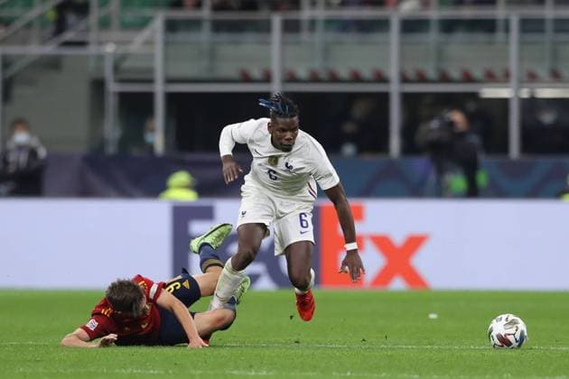 Milan, Italy, 10th October 2021. Gavi of Spain clashes with Paul Pogba of France during the UEFA Nations League match at Stadio Giuseppe Meazza, Milan. Picture credit should read: Jonathan Moscrop Sportimage EDITORIAL USE ONLY. No use with unauthorised audio, video, data, fixture lists, club league logos or live services. Online in-match use limited to 120 images, no video emulation. No use in betting, games or single club league player publications. SPI-1236-0024
