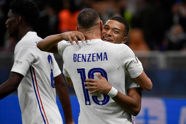 Kylian Mbappe of France celebrates with Karim Benzema of France after scoring the goal of 1-2 during the Uefa Nations League final football match between Spain and France at San Siro stadium in Milano (Italy), October 10th, 2021. Photo Andrea Staccioli Insidefoto andreaxstaccioli
