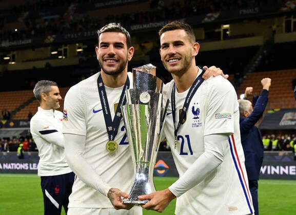 MILAN, ITALY - OCTOBER 10: Lucas Hernandez and Leo Dubois of France celebrates with The UEFA Nations League Trophy following their team s victory in the UEFA Nations League 2021 Final match between Spain and France at San Siro Stadium on October 10, 2021 in Milan, Italy. (Photo by Tullio Puglia - UEFA UEFA via Getty Images Insidefoto Insidefoto) insidefoto