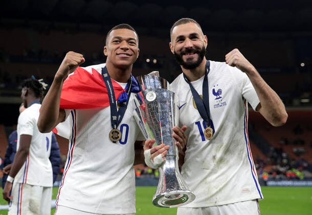 MILAN, ITALY - OCTOBER 10: Kylian Mbappe and Karim Benzema of France celebrate with The UEFA Nations League trophy following victory in the UEFA Nations League 2021 Final match between Spain and France at San Siro Stadium on October 10, 2021 in Milan, Italy. (Photo by Emilio Andreoli - UEFA UEFA via Getty Images Insidefoto Insidefoto) insidefoto