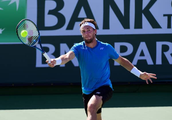 INDIAN WELLS, CA - OCTOBER 11: Casper Ruud of Norway returns a shot during a tennis match played at the BNP Paribas Open on October 11, 2021 at the Indian Wells Tennis Garden in Indian Wells, CA. (Photo by John Cordes Icon Sportswire) TENNIS: OCT 11 BNP Paribas Open Icon5061011032
