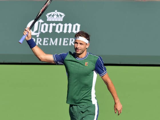 INDIAN WELLS, CA - OCTOBER 11: Grigor Dimitrov (BUL) waves to fans after winning his men s singles match at the BNP Paribas Open on October 11, 2021, at the Indian Wells Tennis Garden in Indian Wells, CA. (Photo by Cynthia Lum Icon Sportswire) TENNIS: OCT 11 BNP Paribas Open Icon250211010688