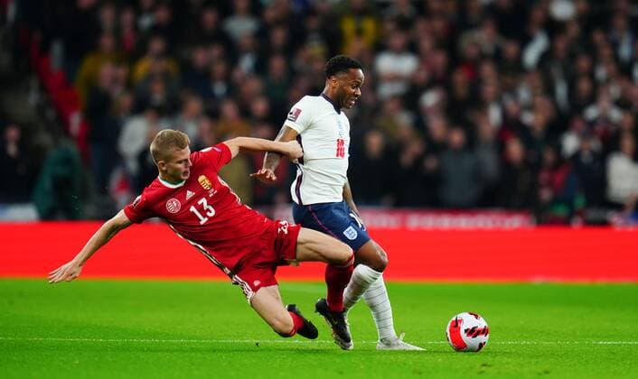 Mandatory Credit: Photo by Javier Garcia Shutterstock (12534018e) Andras Schafer of Hungary battles with Raheem Sterling of England England v Hungary, FIFA World Cup, WM, Weltmeisterschaft, Fussball 2022 Qualifying, Group I, Football, Wembley Stadium, London, UK - 12 Oct 2021 EDITORIAL USE ONLY No use with unauthorised audio, video, data, fixture lists, club league logos or live services. Online in-match use limited to 120 images, no video emulation. No use in betting, games or single club league player publications. England v Hungary, FIFA World Cup 2022 Qualifying, Group I, Football, Wembley Stadium, London, UK - 12 Oct 2021 EDITORIAL USE ONLY No use with unauthorised audio, video, data, fixture lists, club league logos or live services. Online in-match use limited to 120 images, no video emulation. No use in betting, games or single club league player publications.  Copyright: xJavierxGarcia Shutterstockx 12534018e