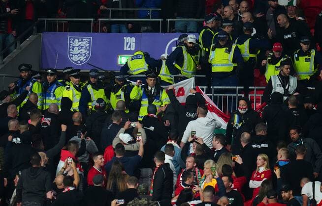 Mandatory Credit: Photo by Javier Garcia Shutterstock (12534018n) Hungary fans clash with police England v Hungary, FIFA World Cup, WM, Weltmeisterschaft, Fussball 2022 Qualifying, Group I, Football, Wembley Stadium, London, UK - 12 Oct 2021 EDITORIAL USE ONLY No use with unauthorised audio, video, data, fixture lists, club league logos or live services. Online in-match use limited to 120 images, no video emulation. No use in betting, games or single club league player publications. England v Hungary, FIFA World Cup 2022 Qualifying, Group I, Football, Wembley Stadium, London, UK - 12 Oct 2021 EDITORIAL USE ONLY No use with unauthorised audio, video, data, fixture lists, club league logos or live services. Online in-match use limited to 120 images, no video emulation. No use in betting, games or single club league player publications.  Copyright: xJavierxGarcia Shutterstockx 12534018n