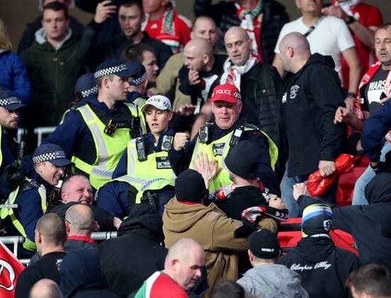 Mandatory Credit: Photo by Matt Impey Shutterstock (12534940a) Police fight with Hungary fans in the stands England v Hungary, Football, World Cup Qualifying, Group I, Wembley Stadium, Wembley, London, UK - 12 10 2021 Editorial use only England v Hungary, Football, World Cup Qualifying, Group I, Wembley Stadium, Wembley, London, UK - 12 10 2021 Editorial use only  Copyright: xMattxImpey Shutterstockx 12534940a