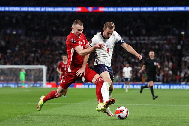 England v Hungary 12 October 2021, London - International Football - World Cup Qualifier - England v Hungary - Harry Kane of England goes down under a challenge from Attila Szalai of Hungary - Photo: Charlotte Wilson Offside. London UK Copyright: xCharlottexWilsonx xOffsidexOffside