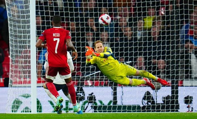 Mandatory Credit: Photo by Javier Garcia Shutterstock (12534018ap) Hungary Goalkeeper Peter Gulacsi pulls off a late save England v Hungary, FIFA World Cup, WM, Weltmeisterschaft, Fussball 2022 Qualifying, Group I, Football, Wembley Stadium, London, UK - 12 Oct 2021 EDITORIAL USE ONLY No use with unauthorised audio, video, data, fixture lists, club league logos or live services. Online in-match use limited to 120 images, no video emulation. No use in betting, games or single club league player publications. England v Hungary, FIFA World Cup 2022 Qualifying, Group I, Football, Wembley Stadium, London, UK - 12 Oct 2021 EDITORIAL USE ONLY No use with unauthorised audio, video, data, fixture lists, club league logos or live services. Online in-match use limited to 120 images, no video emulation. No use in betting, games or single club league player publications.  Copyright: xJavierxGarcia Shutterstockx 12534018ap