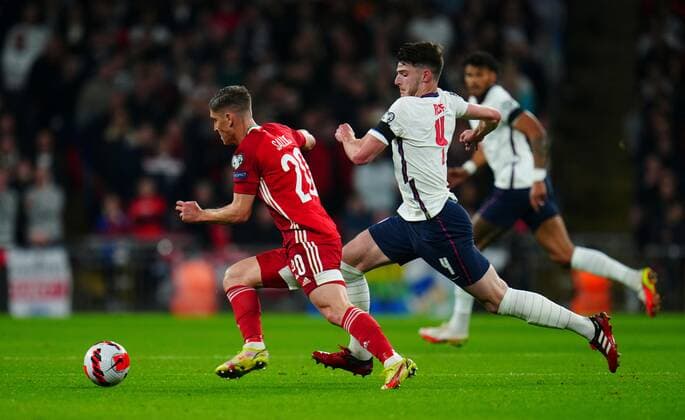 Mandatory Credit: Photo by Javier Garcia Shutterstock (12534018ej) Declan Rice of England chases Roland Sallai of Hungary England v Hungary, FIFA World Cup, WM, Weltmeisterschaft, Fussball 2022 Qualifying, Group I, Football, Wembley Stadium, London, UK - 12 Oct 2021 EDITORIAL USE ONLY No use with unauthorised audio, video, data, fixture lists, club league logos or live services. Online in-match use limited to 120 images, no video emulation. No use in betting, games or single club league player publications. England v Hungary, FIFA World Cup 2022 Qualifying, Group I, Football, Wembley Stadium, London, UK - 12 Oct 2021 EDITORIAL USE ONLY No use with unauthorised audio, video, data, fixture lists, club league logos or live services. Online in-match use limited to 120 images, no video emulation. No use in betting, games or single club league player publications.  Copyright: xJavierxGarcia Shutterstockx 12534018ej