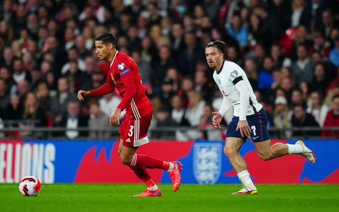 Mandatory Credit: Photo by Javier Garcia Shutterstock (12534018ev) Jack Grealish of England chases Akos Kecskes of Hungary England v Hungary, FIFA World Cup, WM, Weltmeisterschaft, Fussball 2022 Qualifying, Group I, Football, Wembley Stadium, London, UK - 12 Oct 2021 EDITORIAL USE ONLY No use with unauthorised audio, video, data, fixture lists, club league logos or live services. Online in-match use limited to 120 images, no video emulation. No use in betting, games or single club league player publications. England v Hungary, FIFA World Cup 2022 Qualifying, Group I, Football, Wembley Stadium, London, UK - 12 Oct 2021 EDITORIAL USE ONLY No use with unauthorised audio, video, data, fixture lists, club league logos or live services. Online in-match use limited to 120 images, no video emulation. No use in betting, games or single club league player publications.  Copyright: xJavierxGarcia Shutterstockx 12534018ev
