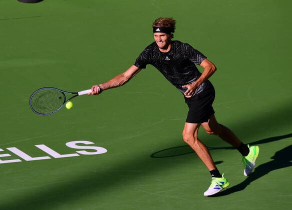 INDIAN WELLS, CA - OCTOBER 12: Alexander Zverev of Germany chases after and returns the ball during a tennis match played at the BNP Paribas Open on October 12, 2021 at the Indian Wells Tennis Garden in Indian Wells, CA. (Photo by John Cordes Icon Sportswire) TENNIS: OCT 12 BNP Paribas Open Icon506211012509