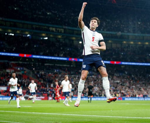 (211013) -- LONDON, Oct. 13, 2021 -- England s John Stones celebrates after scoring during the FIFA World Cup, WM, Weltmeisterschaft, Fussball Qatar 2022 qualification group I match between England and Hungary in London, Britain on Oct. 12, 2021. (Photo by Xinhua) (SP)BRITAIN-LONDON-FOOTBALL-WORLD CUP QUALIFYING-ENGLAND VS HUNGARY MatthewxImpey 