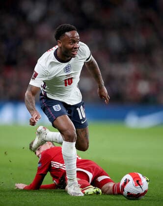 (211013) -- LONDON, Oct. 13, 2021 -- England s Raheem Sterling (front) vies with Hungary s Szabolcs Schon during the FIFA World Cup, WM, Weltmeisterschaft, Fussball Qatar 2022 qualification group I match between England and Hungary in London, Britain on Oct. 12, 2021. (Photo by Xinhua) (SP)BRITAIN-LONDON-FOOTBALL-WORLD CUP QUALIFYING-ENGLAND VS HUNGARY MatthewxImpey 