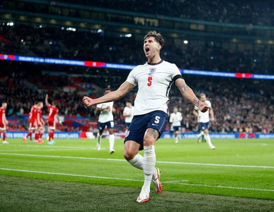 (211013) -- LONDON, Oct. 13, 2021 -- England s John Stones celebrates after scoring during the FIFA World Cup, WM, Weltmeisterschaft, Fussball Qatar 2022 qualification group I match between England and Hungary in London, Britain on Oct. 12, 2021. (Photo by Xinhua) (SP)BRITAIN-LONDON-FOOTBALL-WORLD CUP QUALIFYING-ENGLAND VS HUNGARY MatthewxImpey 
