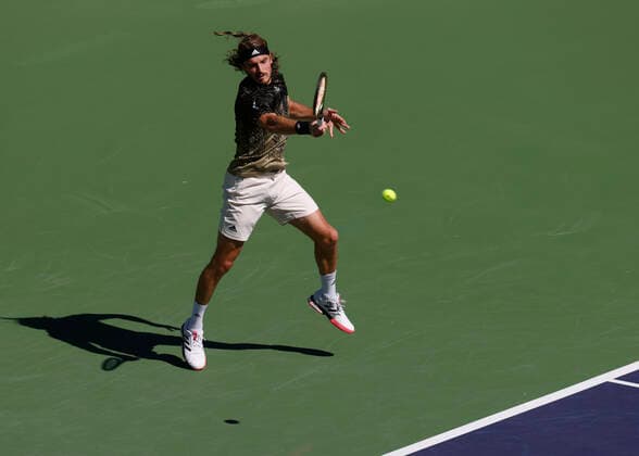 October 15, 2021 Stefanos Tsitsipas of Greece returns a shot against Nikoloz Basilashvili of Georgia during their quarterfinal match of the 2021 BNP Paribas Open at Indian Wells Tennis Garden in Indian Wells, California. Mandatory Photo Credit : CSM Indian Wells United States of America - ZUMAc04_ 20211015_zaf_c04_057 Copyright: xCharlesxBausx