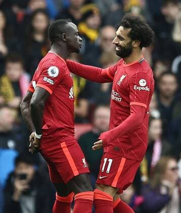 Sport Themen der Woche KW41 Mandatory Credit: Photo by Michael Zemanek Shutterstock (12538820h) Sadio Mane of Liverpool celebrates scoring the opening goal with team-mate Mohamed Salah Watford v Liverpool, Premier League, Football, Vicarage Road, Watford, UK - 16 Oct 2021 EDITORIAL USE ONLY No use with unauthorised audio, video, data, fixture lists, club league logos or live services. Online in-match use limited to 120 images, no video emulation. No use in betting, games or single club league player publications. Watford v Liverpool, Premier League, Football, Vicarage Road, Watford, UK - 16 Oct 2021 EDITORIAL USE ONLY No use with unauthorised audio, video, data, fixture lists, club league logos or live services. Online in-match use limited to 120 images, no video emulation. No use in betting, games or single club league player publications.  Copyright: xMichaelxZemanek Shutterstockx 12538820h