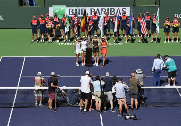 INDIAN WELLS, CA - OCTOBER 16: BNP Paribas Open doubles champions Su-Wei Hsieh of Chinese Taipei and Elise Mertens of Belgium stand for photographs with the champions trophy and doubles runners up Elena Rybakina of Kazakhstan and Veronika Kudermetova of Russia after a doubles finals tennis match on October 16, 2021 at the Indian Wells Tennis Garden in Indian Wells, CA. (Photo by John Cordes Icon Sportswire) TENNIS: OCT 16 BNP Paribas Open Icon506211016009