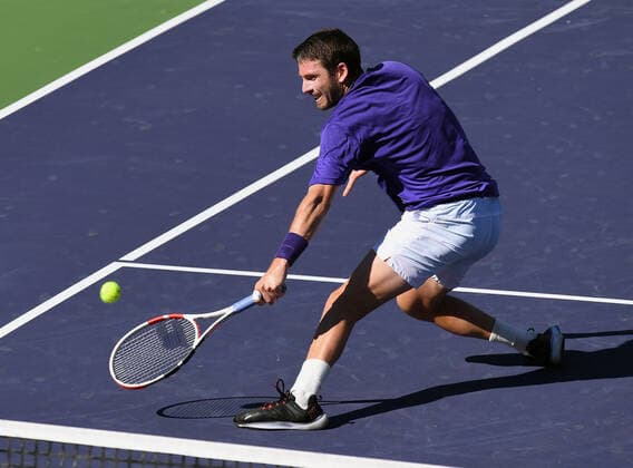 INDIAN WELLS, CA - OCTOBER 16: Cameron Norrie of Great Britain charges the net and returns the ball during a semifinal tennis match played on October 16, 2021 at the BNP Paribas Open at the Indian Wells Tennis Garden in Indian Wells, CA. (Photo by John Cordes Icon Sportswire) TENNIS: OCT 16 BNP Paribas Open Icon506211016206