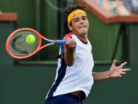 INDIAN WELLS, CA - OCTOBER 16: Taylor Fritz of the United States returns the ball during a semifinal tennis match played on October 16, 2021 at the BNP Paribas Open at the Indian Wells Tennis Garden in Indian Wells, CA. (Photo by John Cordes Icon Sportswire) TENNIS: OCT 16 BNP Paribas Open Icon506211016734