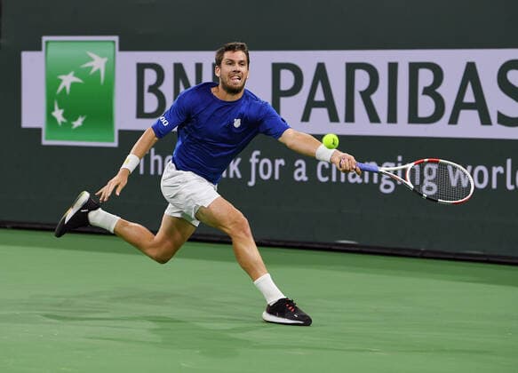 INDIAN WELLS, CA - OCTOBER 17: Cameron Norrie of Great Britain returns the ball during a finals tennis match at the BNP Paribas Open played on October 17, 2021 at the Indian Wells Tennis Garden in Indian Wells, CA. (Photo by John Cordes Icon Sportswire) TENNIS: OCT 17 BNP Paribas Open Icon506211017911