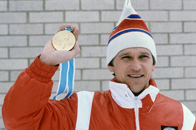 155836 23.02.1980 Alexander Tikhonov, who took part in four Winter Olympics and won four gold medals in the biathlon event, holds gold medal he received during the Thirteenth Winter Olympics in Lake Placid, New York, the United States. 1980. Dmitryi Donskoy Sputnik TIKHONOV BIATHLON CHAMPION 