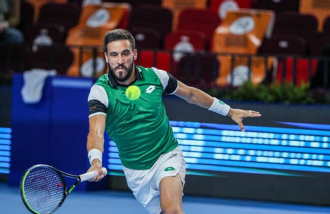 MOSCOW, RUSSIA - OCTOBER 18, 2021: Bosnia and Herzegovina s Damir Dzumhur in action in his menâ€™s singles Round of 32 tennis match against Croatiaâ€™s Marin Cilic at the VTB Kremlin Cup 2021 at the Luzhniki Palace of Sports. Mikhail Tereshchenko TASS  TS1149E0