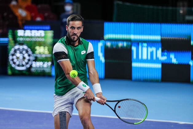 MOSCOW, RUSSIA - OCTOBER 18, 2021: Bosnia and Herzegovina s Damir Dzumhur in action in his menâ€™s singles Round of 32 tennis match against Croatiaâ€™s Marin Cilic at the VTB Kremlin Cup 2021 at the Luzhniki Palace of Sports. Mikhail Tereshchenko TASS  TS1149E4