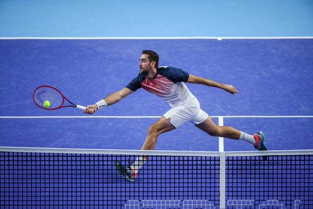 MOSCOW, RUSSIA - OCTOBER 18, 2021: Croatiaâ€™s Marin Cilic in action in his menâ€™s singles Round of 32 tennis match against Bosnia and Herzegovina s Damir Dzumhur at the VTB Kremlin Cup 2021 at the Luzhniki Palace of Sports. Mikhail Tereshchenko TASS  TS1149E7