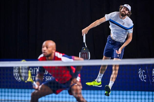 US Reilly Opelka and American Nicholas Monroe pictured in action during a match between Italian-French pair Musetti-Paire and US pair Monroe-Opelka, in the first round of the European Open Tennis ATP, Tennis Herren tournament, in Antwerp, Monday 18 October 2021. LAURIExDIEFFEMBACQ  x3116671x