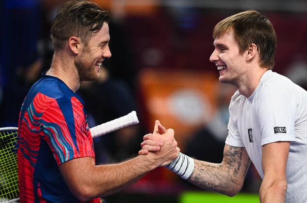 6675360 19.10.2021 Kazakhstan s Alexander Bublik, right, and Ukraine s Illya Marchenko shake hands after the men s singles first round tennis match at the Kremlin Cup, in Moscow, Russia. Vladimir Astapkovich Sputnik Russia Tennis Kremlin Cup  78b3dadef4f3a927