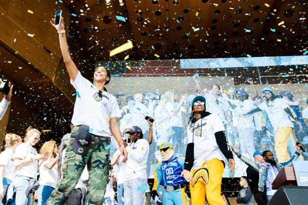 The Loop Chicago Sky players Diamond DeShields and Candace Parker on stage during the Chicago Sky Championship Parade and Rally on October 19, 2021 at the Pritzker Pavilion Shaina Benhiyoun SPP Chicago Sky 2021 Championship Parade and Rally 